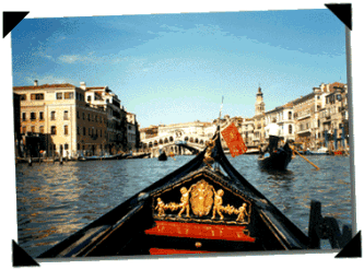 View from a gondola on the Grand Canal of Venice Italy.